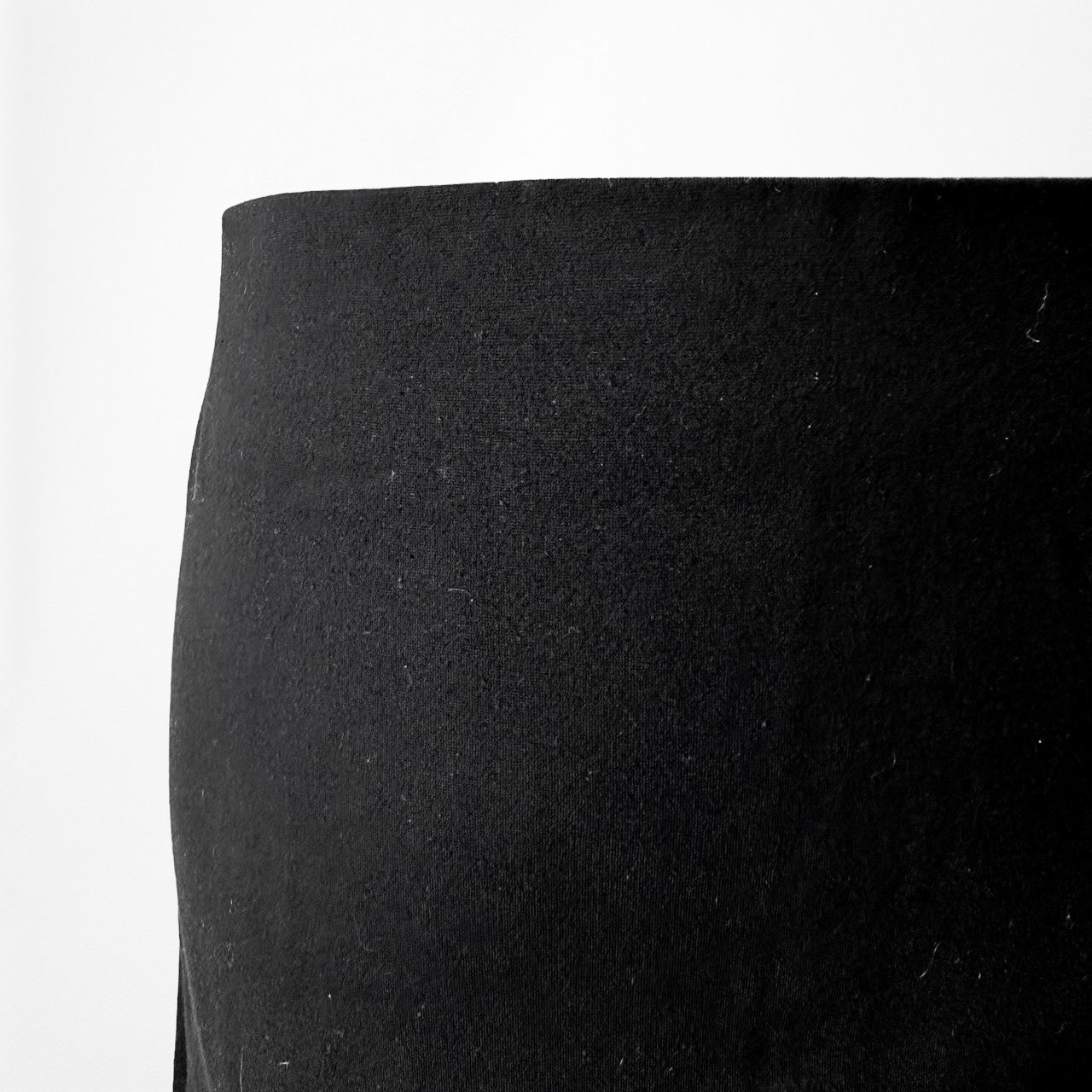 https://poshmark.com/listing/Vintage-Y2K-Black-Knit-Knee-Length-Bodycon-PencilSkirtSize6M-69c576a714d7a60ebdff31dc